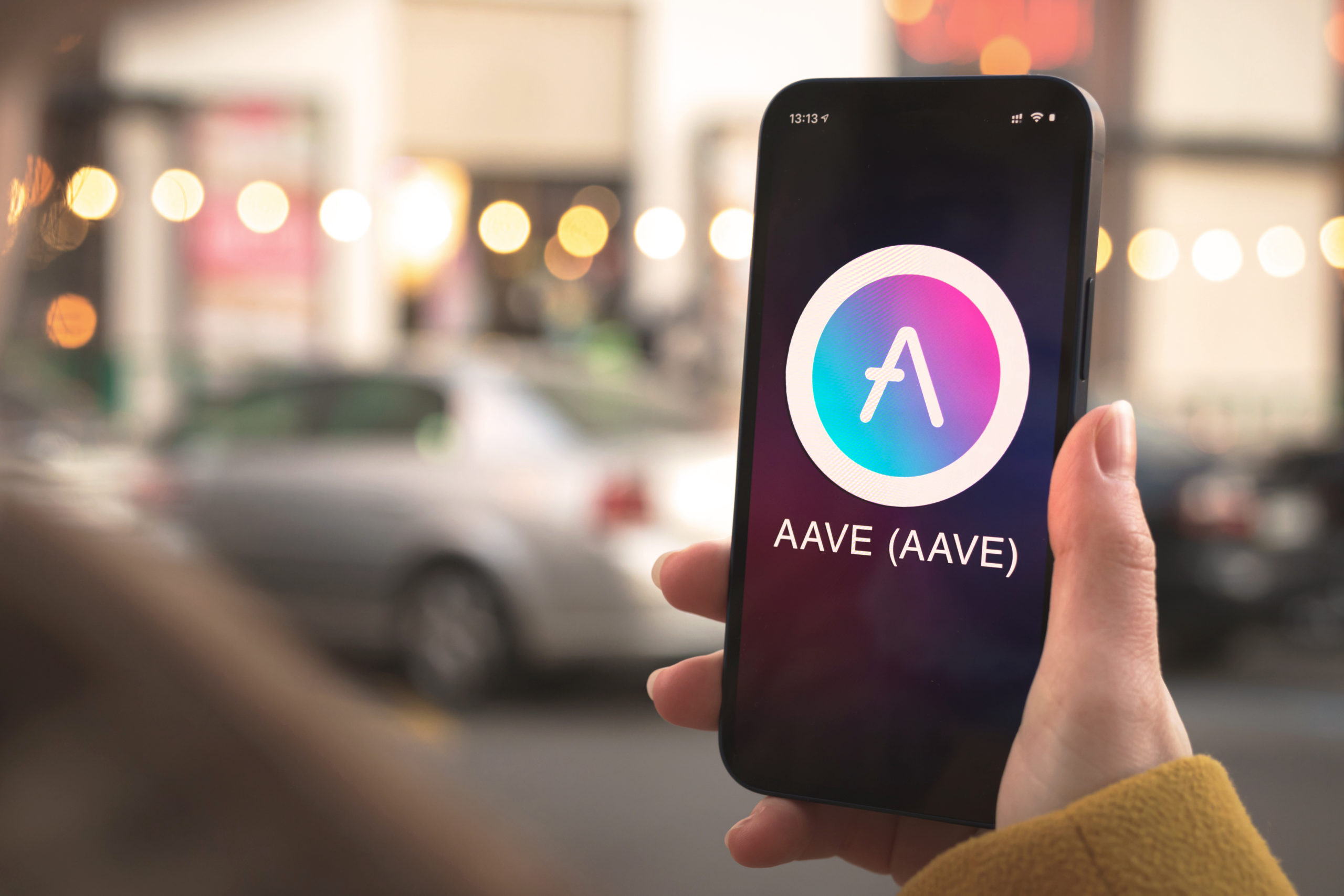 aave symbol logo smartphone scaled 1 Aave adopts proposal to temporarily pause ETH borrowing