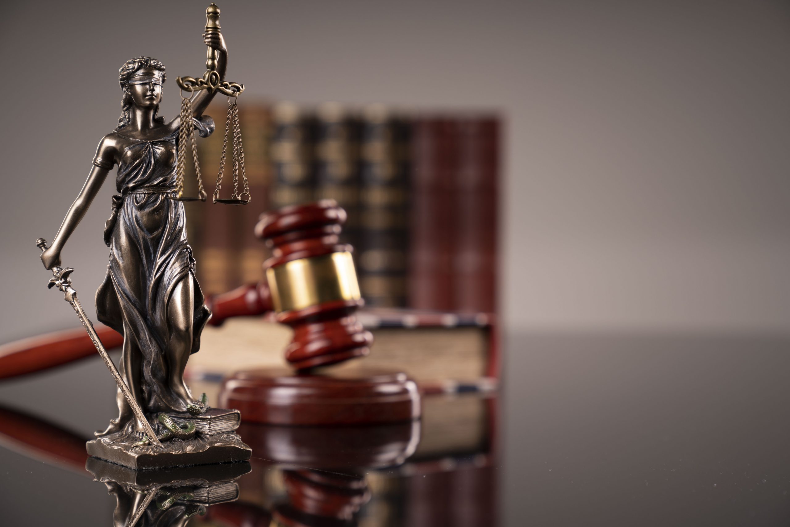 judge gavel statue justice scaled Sparkster to pay $35M to ‘harmed’ ICO investors after SEC charge